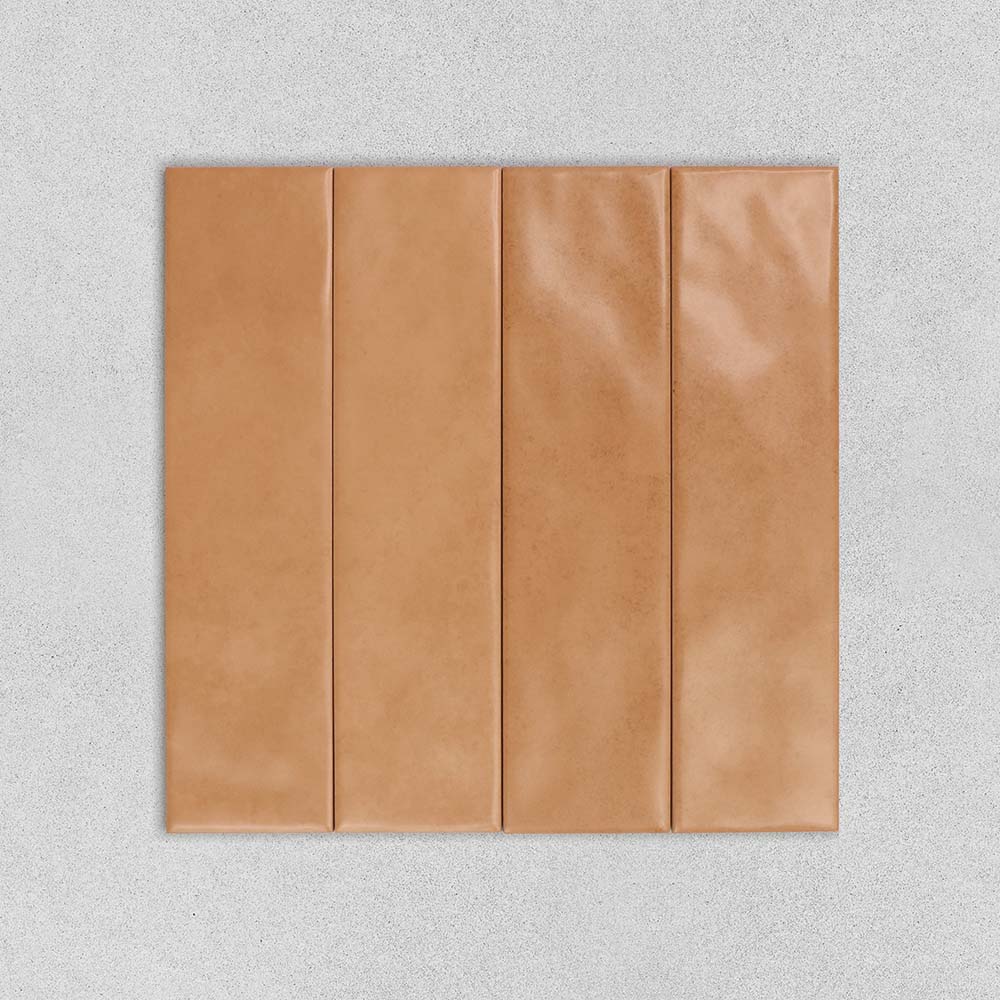 Artisan Terra 75x300 wall tiles in warm terracotta tones displayed in a stacked tile layout