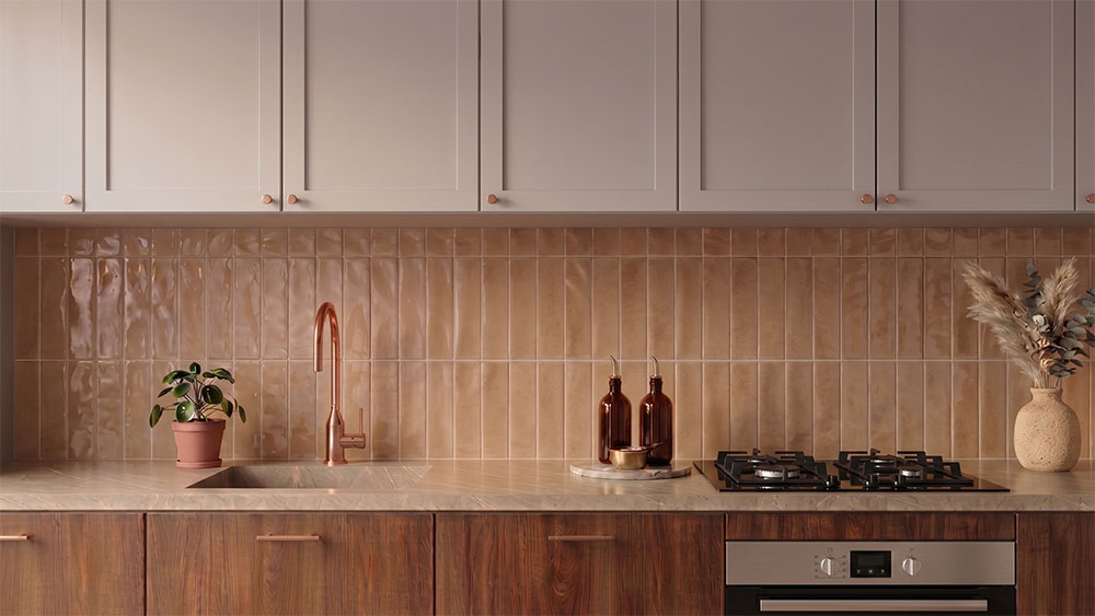 Warm-toned kitchen featuring Artisan Terra tiles used as a splashback, creating a natural, earthy aesthetic.
