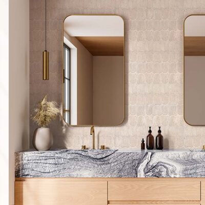 Bellaflair shield-shaped mosaic tile range adding luxury and sculpted texture.