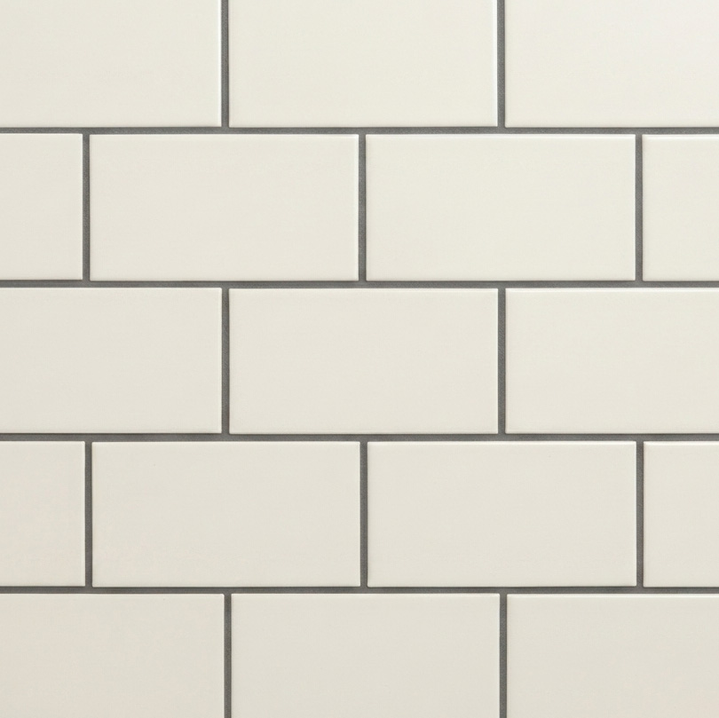 Brick bond tile pattern with rectangular tiles laid in a traditional staggered layout for a timeless finish.