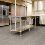Industrial kitchen with heavy-duty P5 R12 tiles providing maximum grip in wet and greasy conditions.
