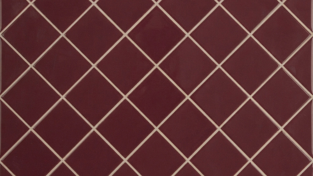 Diamond tile pattern with square tiles installed on a 45 degree angle to create a striking geometric effect.