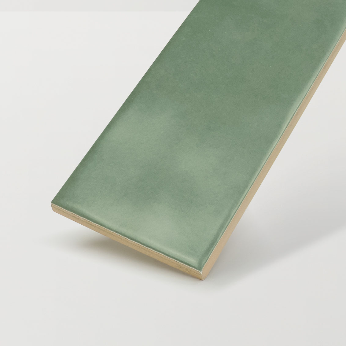 Close-up of a glazed tile with a smooth satin matt finish and subtle sheen.