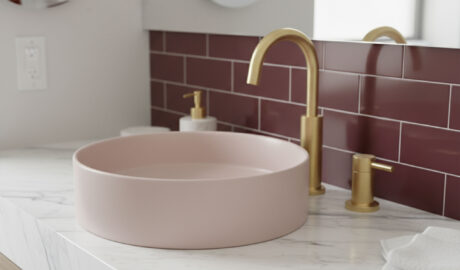 Bathroom interior featuring glazed tiles on walls and floor for a modern, clean look.