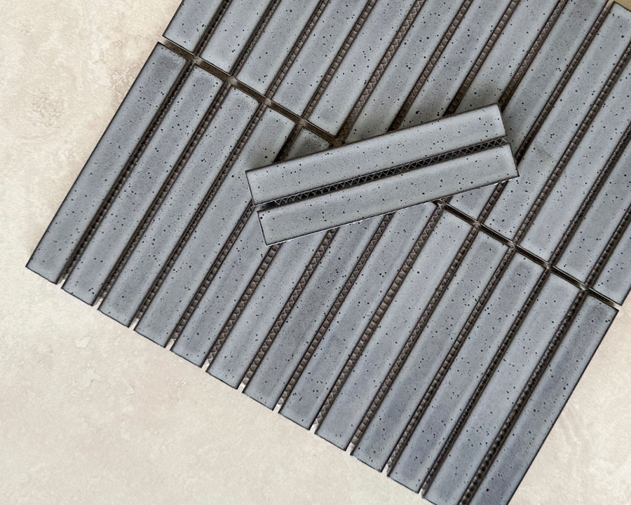 Grey tiles and interior design inspiration demonstrating the balanced and sophisticated qualities of grey colour psychology