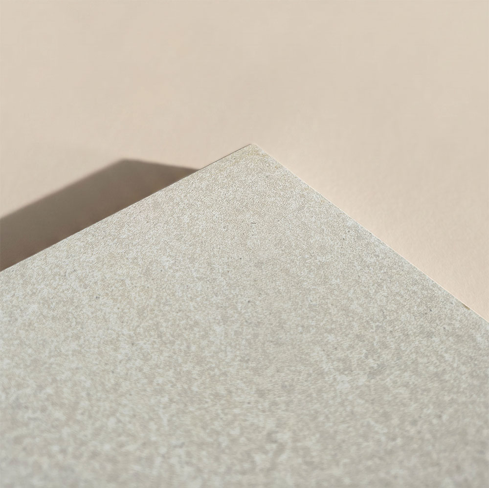 Porcelain tiles with a grit finish providing enhanced slip resistance