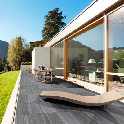 Hampton outdoor porcelain tile range with grit finish and concrete look.