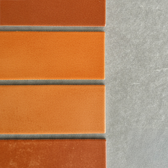 Vibrant orange tiles stacked in a pattern