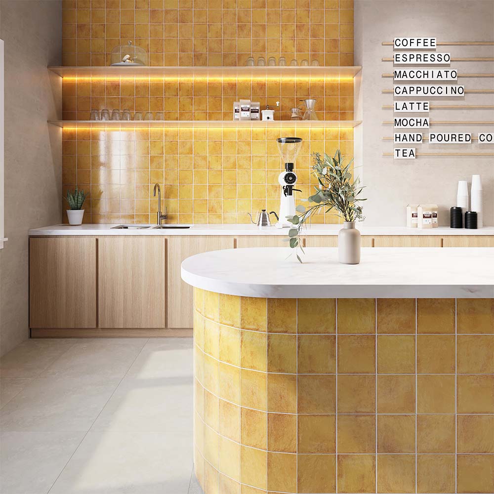 Cafe-style kitchen featuring Solar Amber 150x150 gloss and matt tiles in warm amber tones