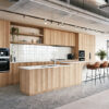 A bright kitchen featuring a spacious island with bar stools, showcasing Solar White and Ash finishes.