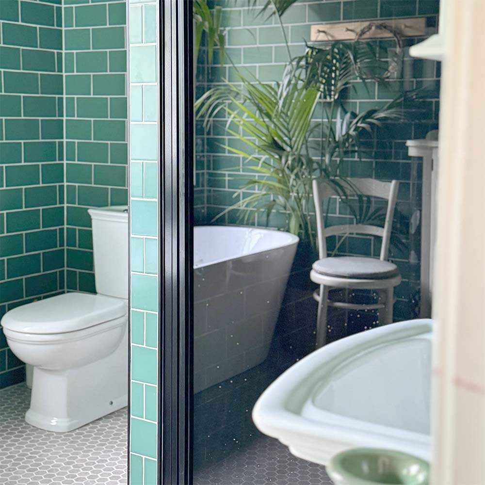 Stylish bathroom interior showcasing Spectrum Plus wall tiles and modern fixtures