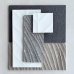 Organic and textured grey tiles, adding depth and character to any space.