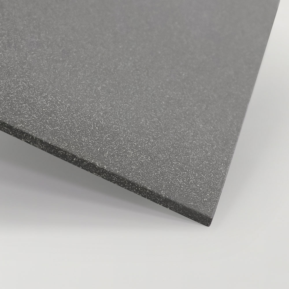 Close-up of an unglazed tile highlighting its consistent colour and natural texture.
