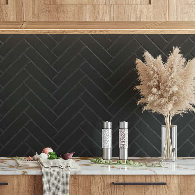 Vintage Dark Grey tiles installed as a kitchen splashback with a textured dark grey finish