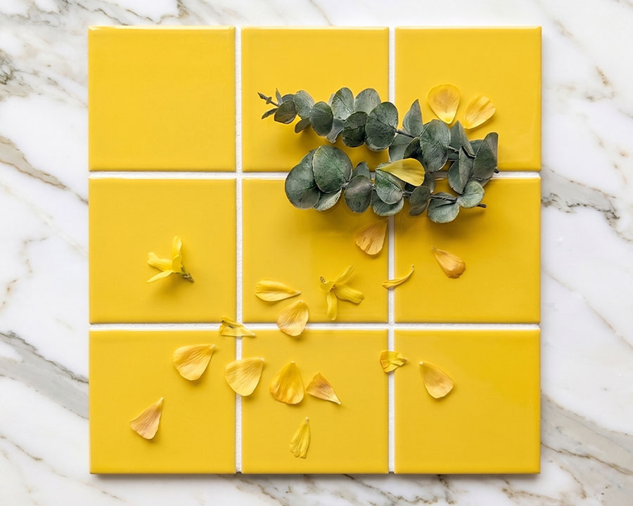 Yellow tiles and interior design inspiration showcasing the uplifting and energetic qualities of yellow colour psychology